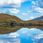 A range of mountains over the lake