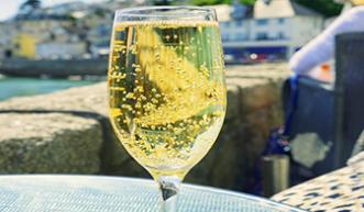 A glass of sparking wine