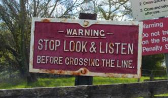 Railway crossing warning sign