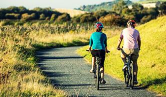 Two cyclists on a cycle path
