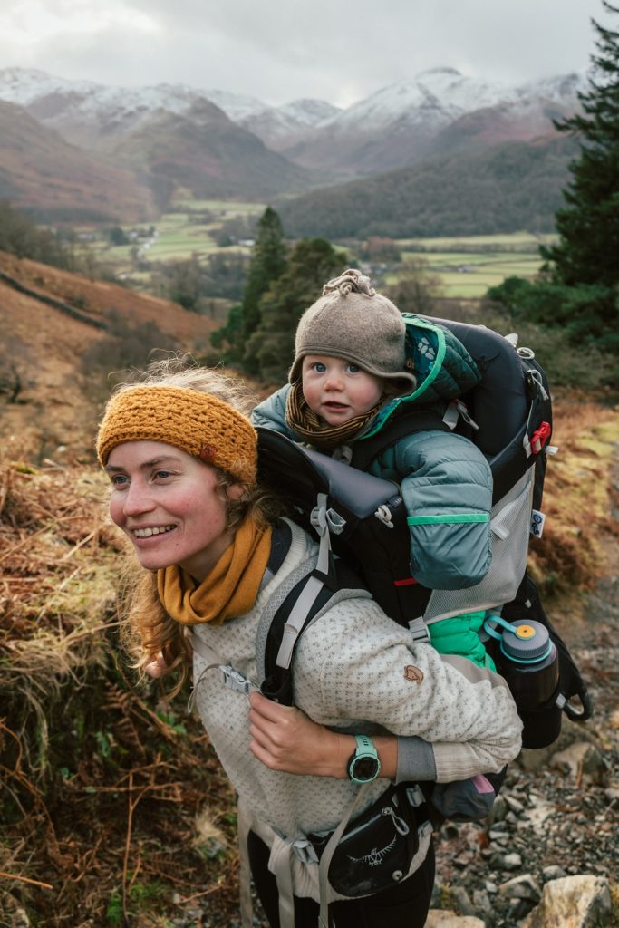 ramble.family @athenamellor hiking with a baby on her back