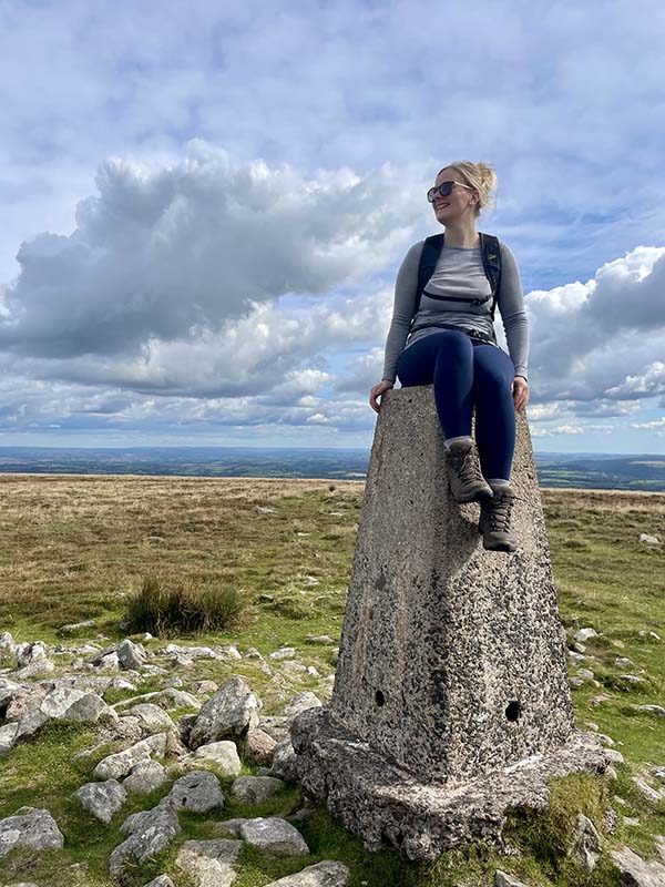 Holly Atyeo on a Trig point