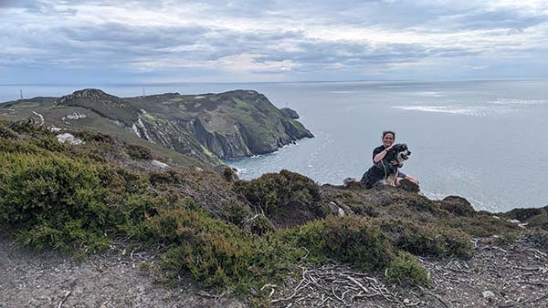 Hilary and Ziggy on the cliffs on the north wales coast path between south stack and north stack