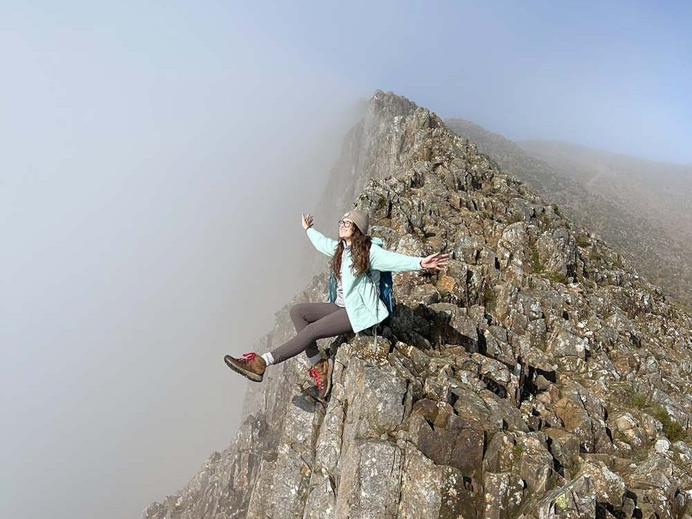 Amy Jones OS Champion on a ridge 