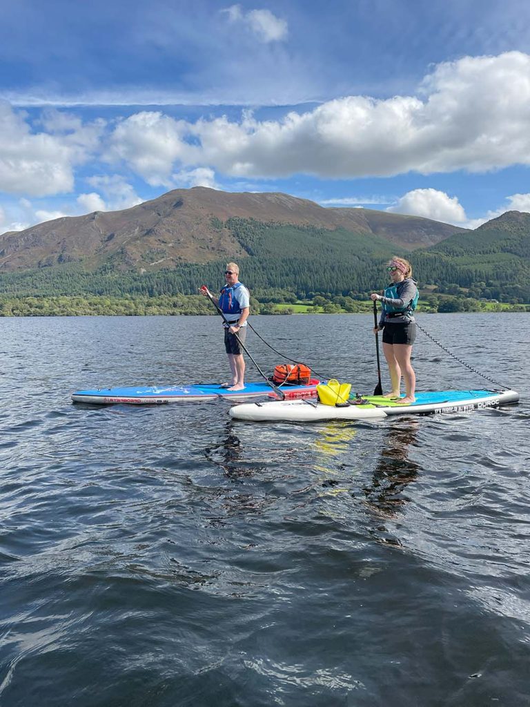 2 paddleboarders on Bassenthwaite Lake District Paddle Boarding