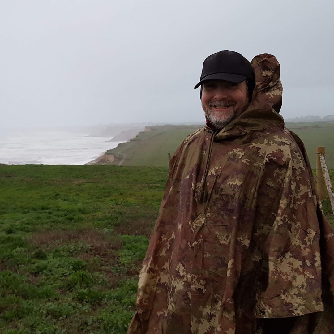 Jonathan Elder in a poncho