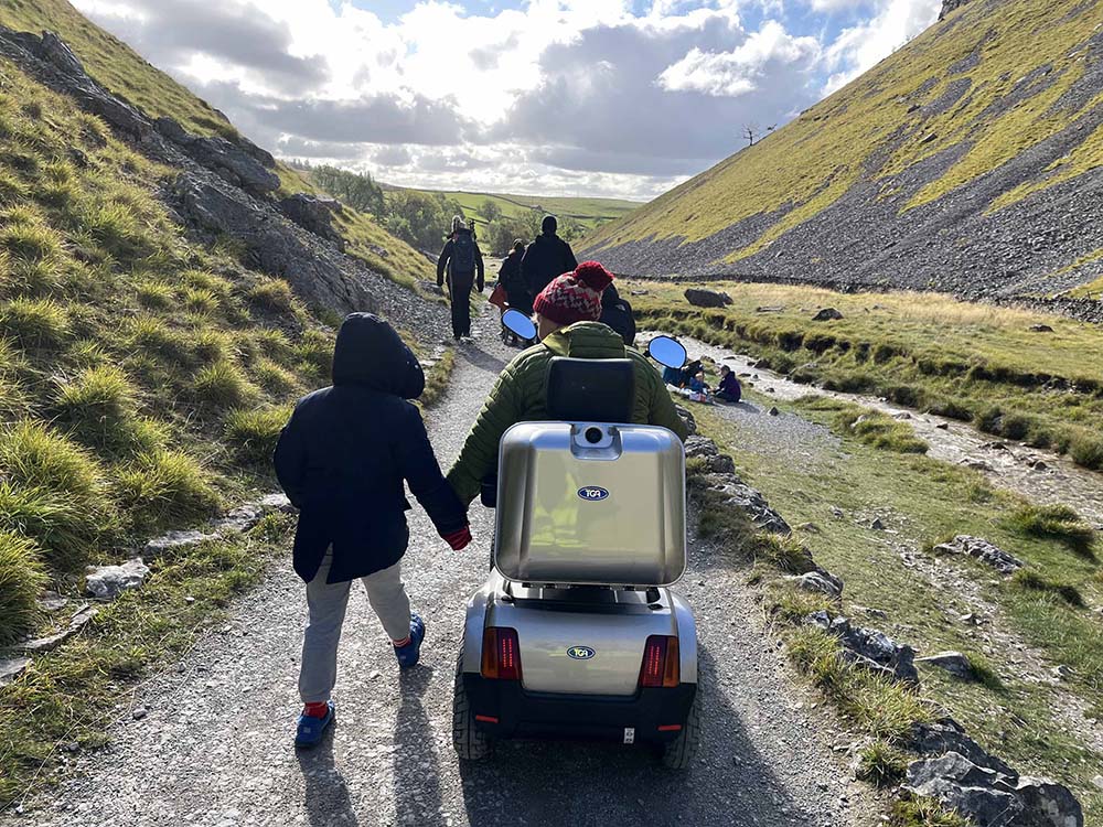 Accessible Walks - A guided walk with a group of children with SEND at Malham with Access the Dales. Part of the YHA Festival of Walking