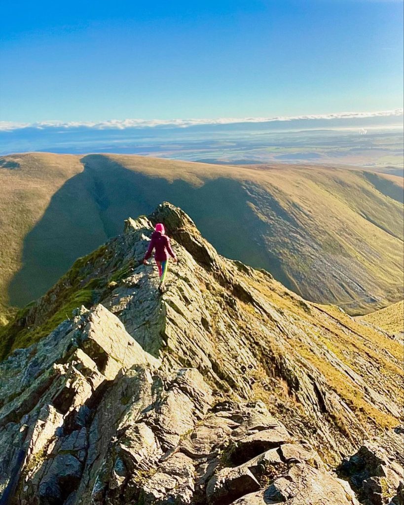 claire on sharp edge solo hiking