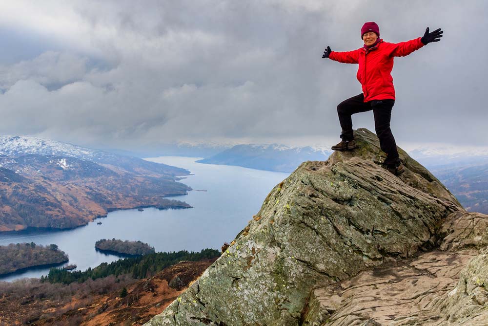 Felicity on top of the world on Ben A’an  above Loch Katrine