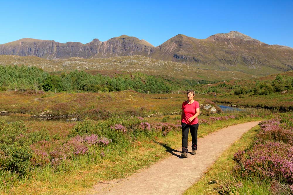 This image of Felicity on the the Little Assynt trail uses the rule of thirds and the path leads the eye into the scene