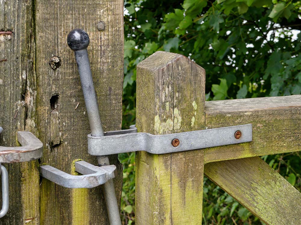 A latching gate as you would find across public park areas in England, UK. Often found on a bridlepath