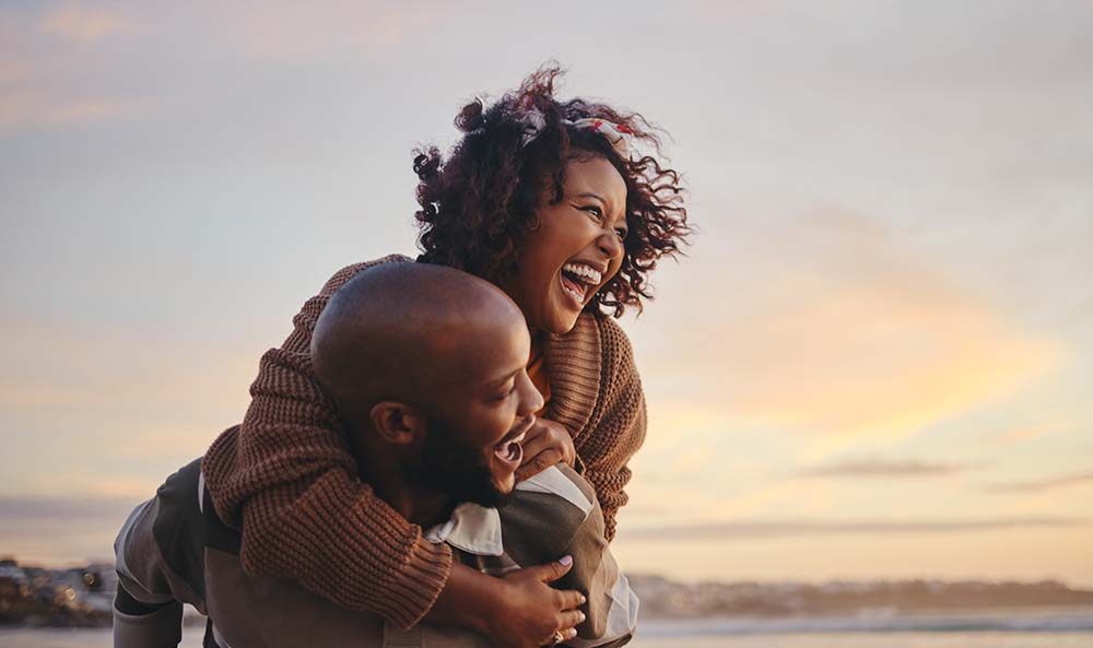 couple hugging and having fun outdoors