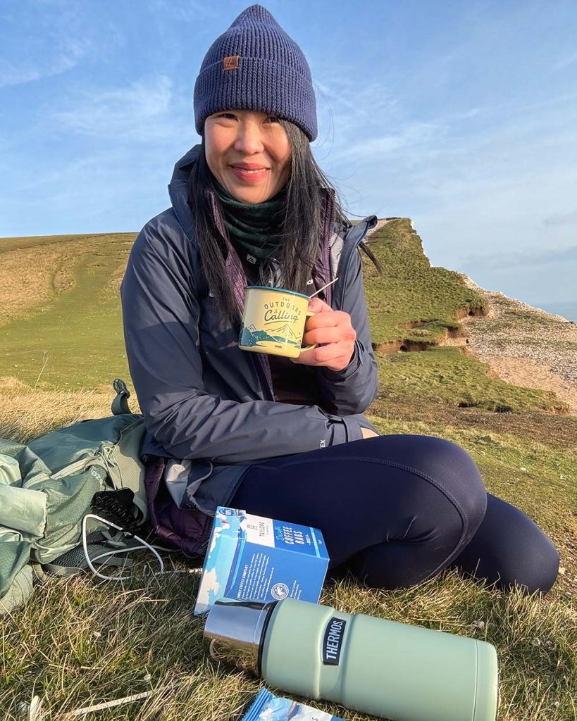 May Cheung drinking coffee