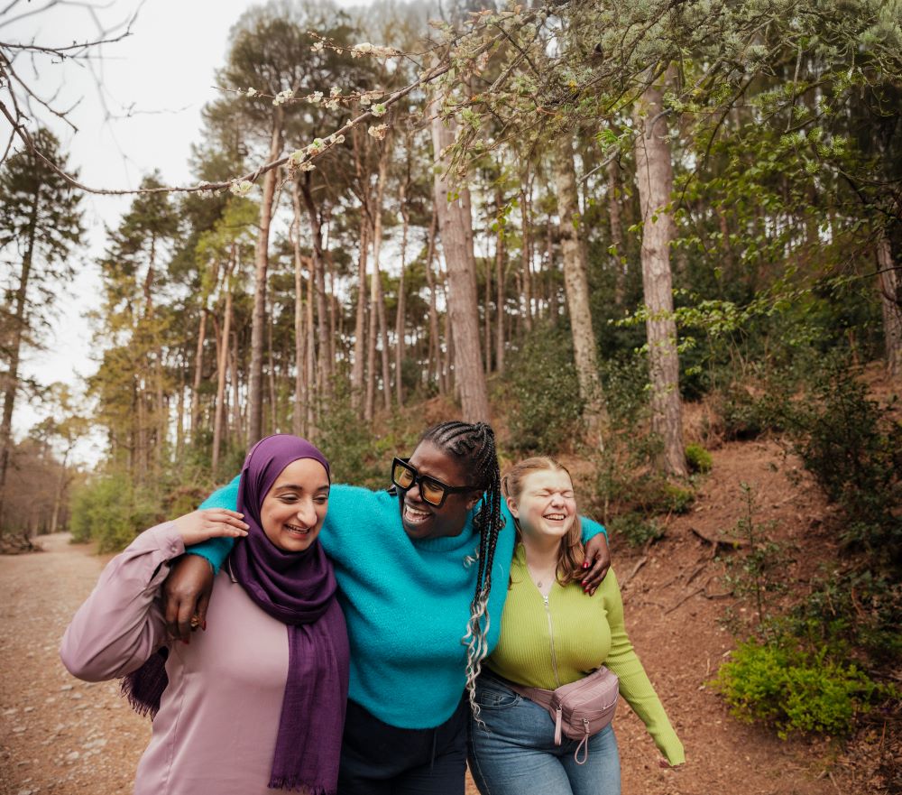 women walking in the countryside