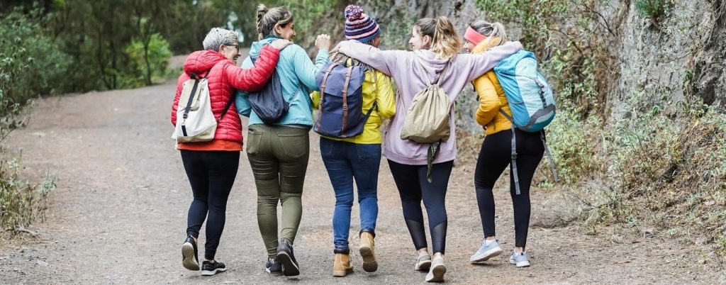 Group of women on a walk image taken from behind