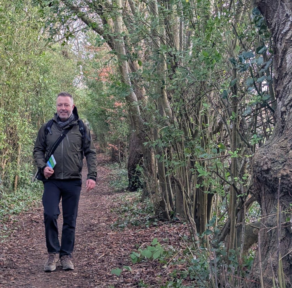 andrew walking down a path
