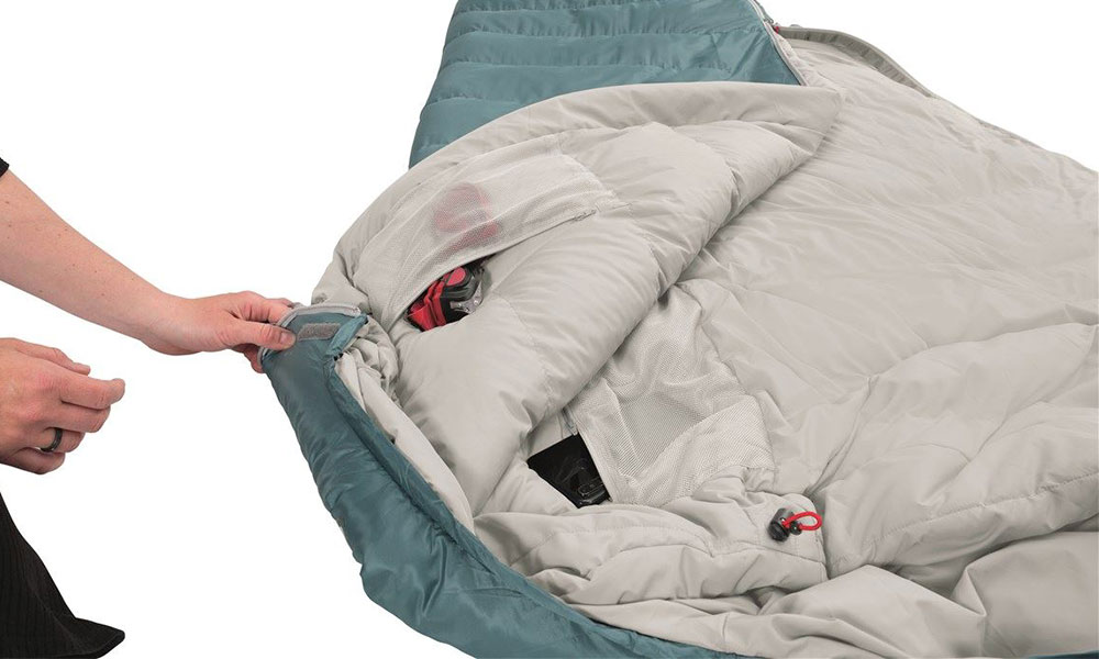 Outwell sleeping bag with internal pockets 
