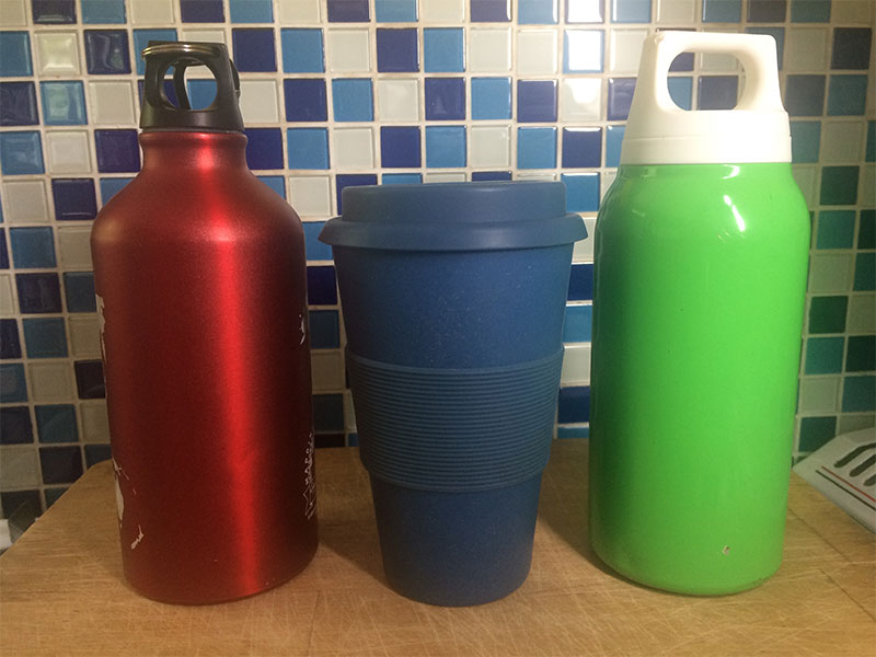 Reusable bottles and coffee cup