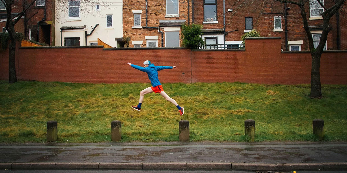 Rory jumping across bollards on his running route